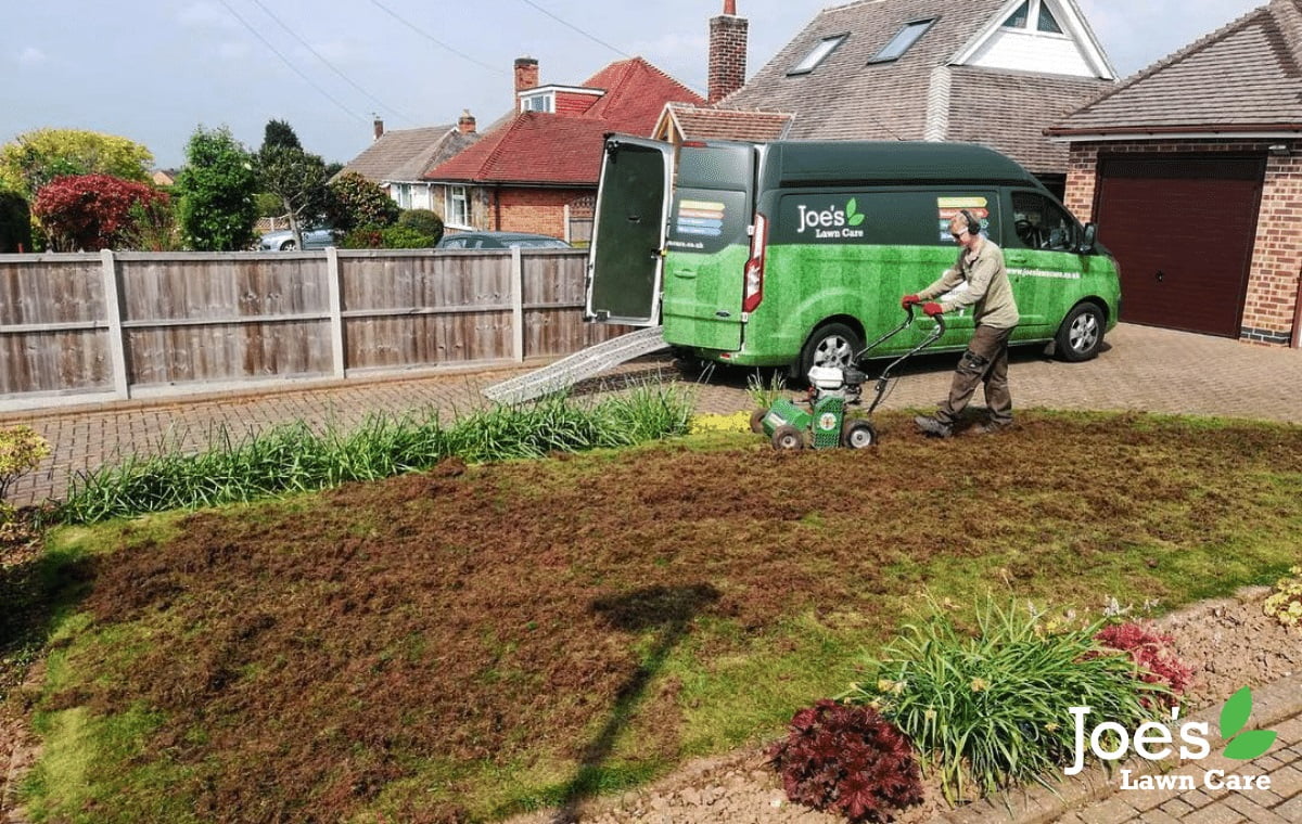 Joe's Lawn Care removing thatch 