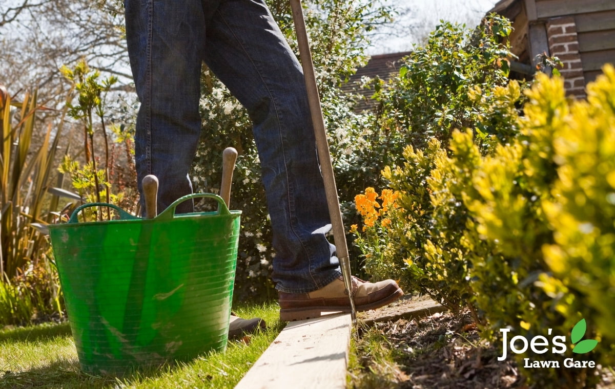 Use a board to get those straight lines at the edge of your lawn